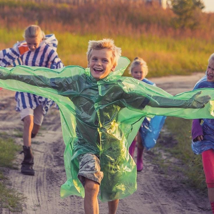 Lena Park, Lead Design Curator at Oak Moss Ripple, reviewing corporate floral arrangements